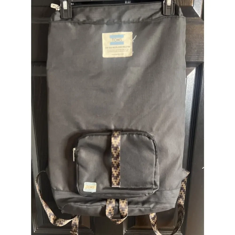 Toms StandUp Backpack Solid Black W/ Aztec detail Zipper Closure Fold-over Flaws